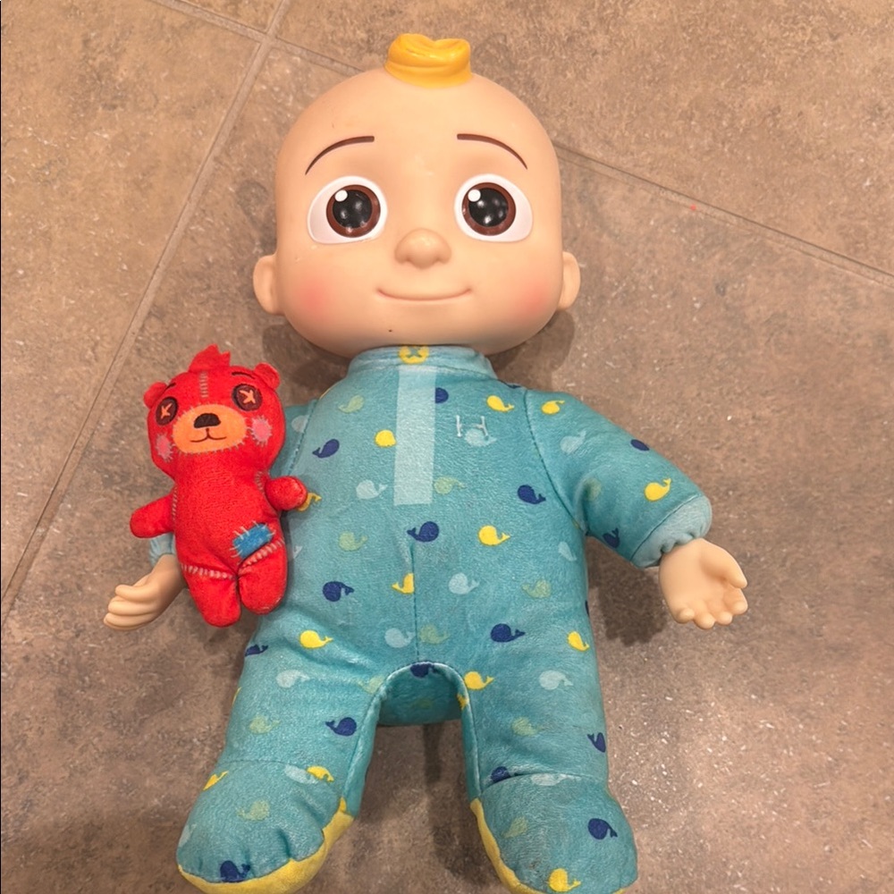 Cocomelon taking doll